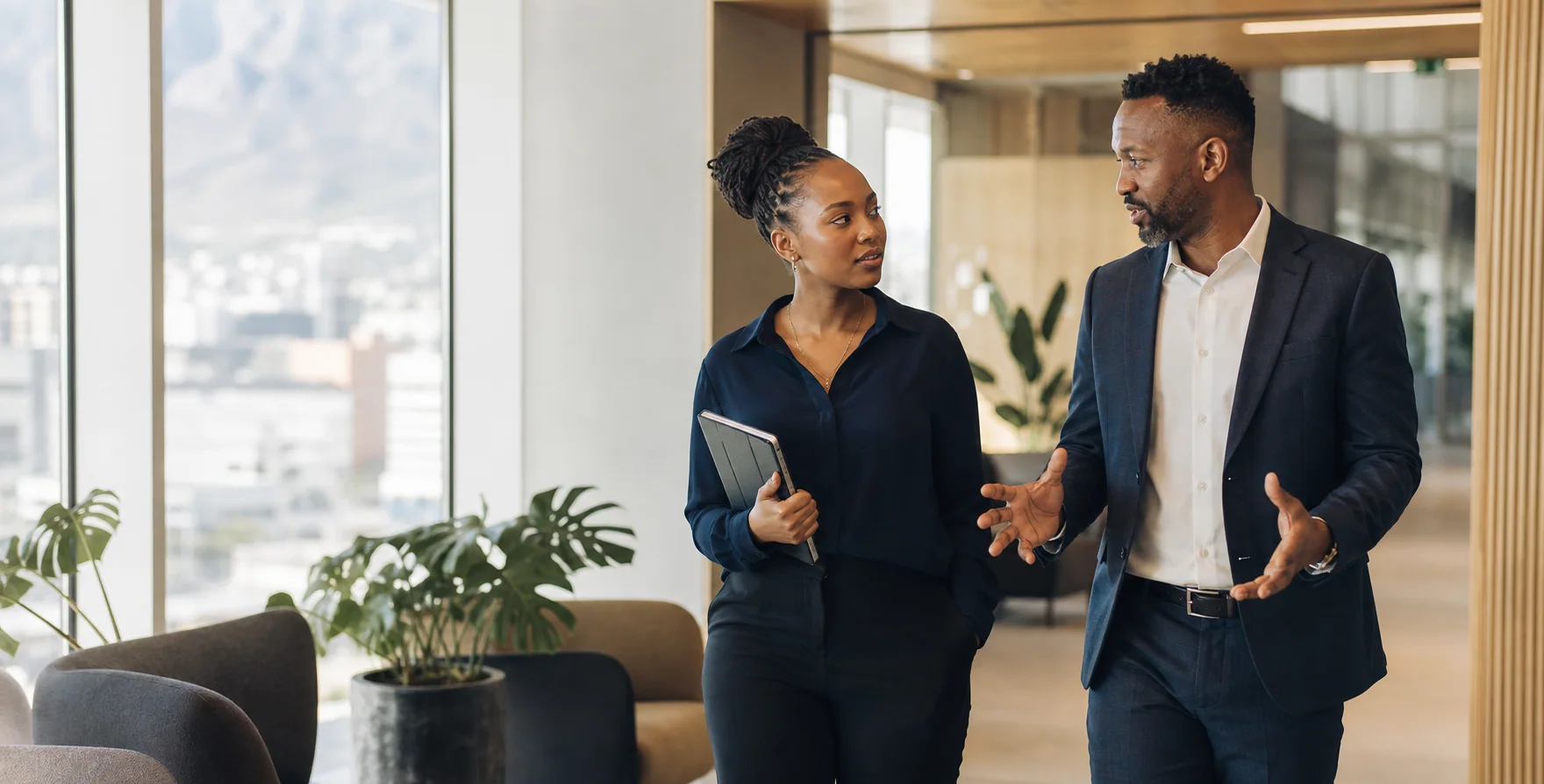 South African professionals collaborating in a modern office
